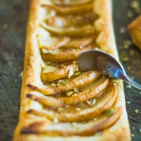 Chai Spiced Pear Tarts With Crushed Pumpkin Seeds